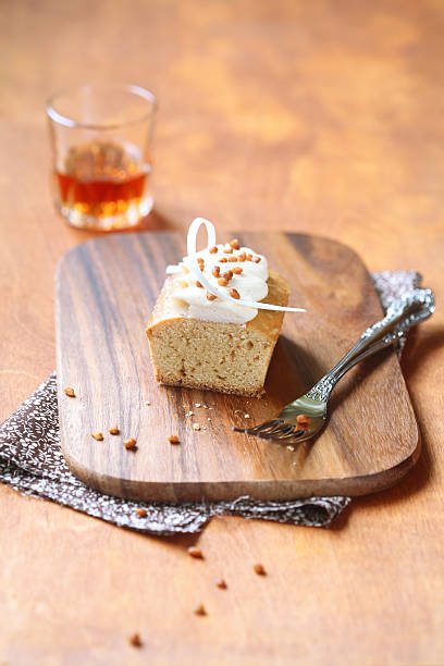 istock Cut of rectangular Cake with White Chocolate Cream Cheese Frosting 511981586