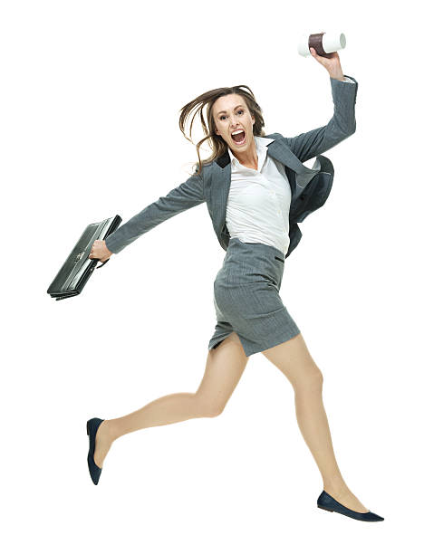 istock Excited businesswoman jumping 511983868