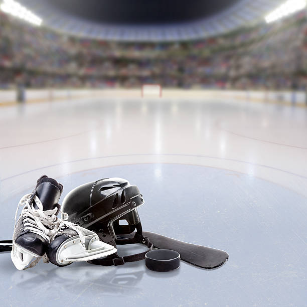 istock Dramatic Hockey Arena With Equipment on Ice and Copy Space 511985024