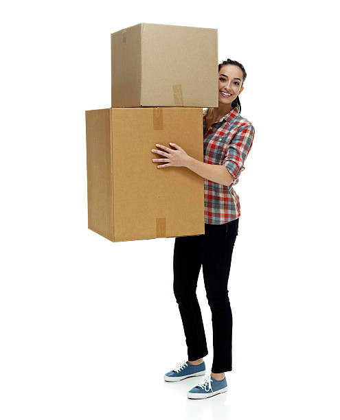 istock Cheerful female holding box 511986086