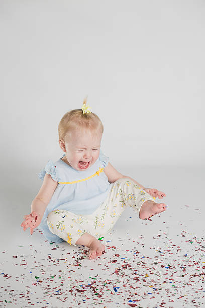 istock Crying Girl in Confetti 511986810