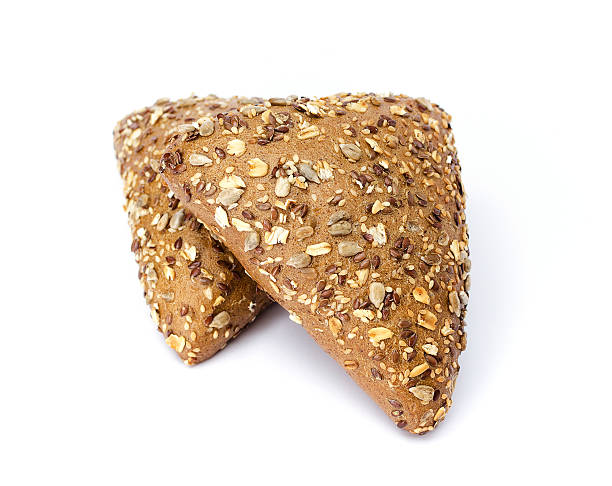 istock Dark buns with sunflower seeds, sesame and flax. White background 511989176