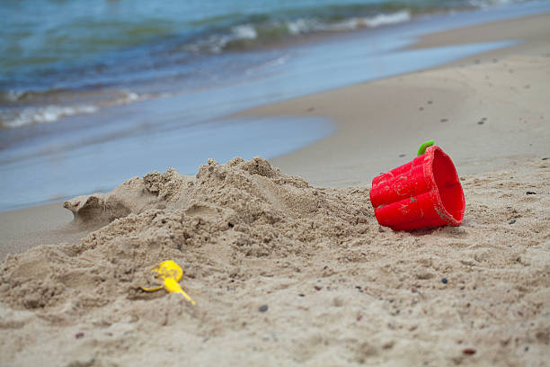 istock toys on sea beach 511989582