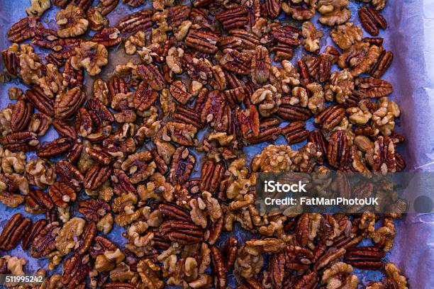 Mix Nuts Covered In Butter Garlic And Rosemary Mixture Stock Photo - Download Image Now