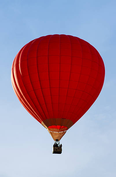 istock Red hot-air balloon in the sky 511996052
