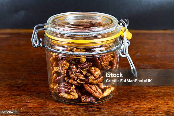 Jar With Mixed Garlic And Rosemary Roasted Nuts Stock Photo - Download Image Now - Bar - Drink Establishment, Brown, Butter