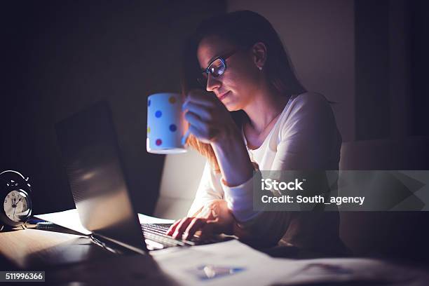Tired Woman Working At Homemaking A Break Stock Photo - Download Image Now - Dark, Working At Home, 20-29 Years