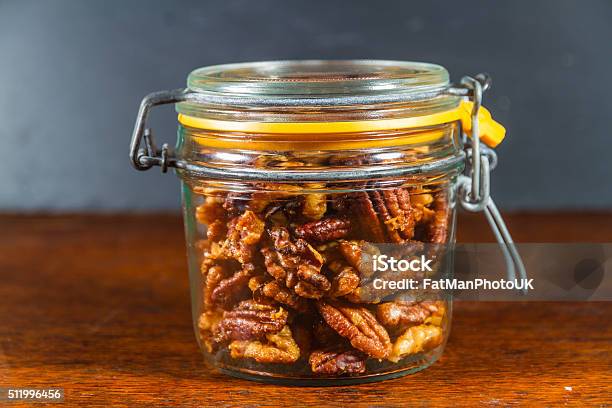 Jar With Mixed Garlic And Rosemary Roasted Nuts Stock Photo - Download Image Now - Bar - Drink Establishment, Brown, Butter