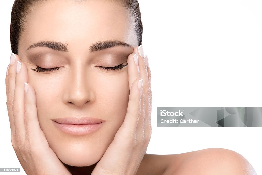 Concepto de cuidado de la piel y belleza. Rostro de mujer joven Natural - Foto de stock de Flexibilidad libre de derechos