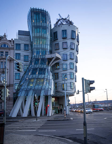 Dancing house in Prague, Czech Republic Prague, Czech Republic - February 18, 2016: Modern building, also known as the Dancing House, designed by Vlado Milunic and Frank O. Gehry stands on the Rasinovo Nabrezi. dancing house prague stock pictures, royalty-free photos & images