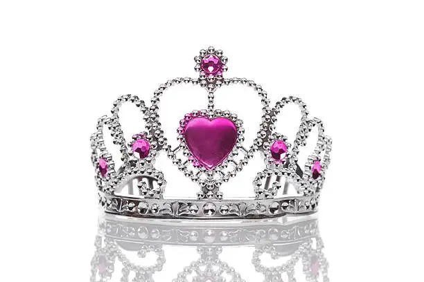 Tiara with diamonds and purple gem, isolated on white background