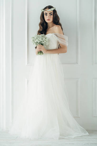 istock Studio shot of young beautiful bride 511998642