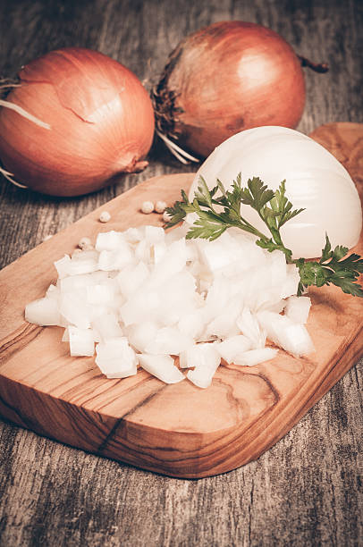 istock Whole and sliced onions 511998922