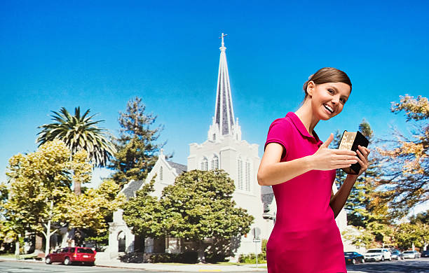 istock Female gesturing to go church with her hand 512000090