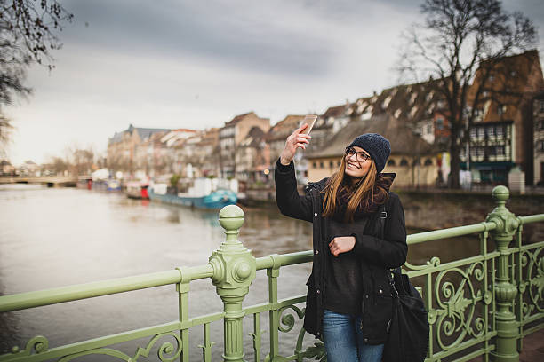 istock Woman looking at mobile phone 512001680