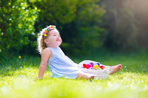 istock Cute little girl on Easter egg hunt 512001800