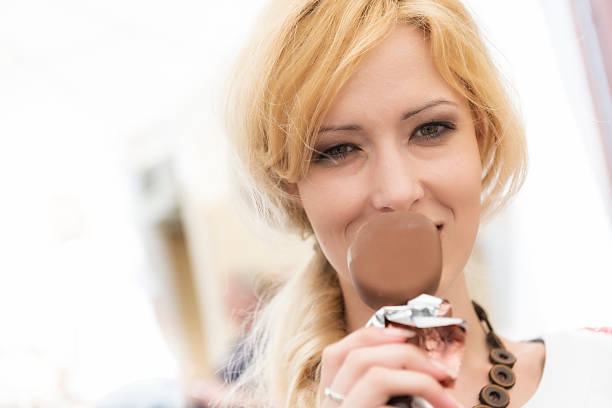 istock woman eating ice-cream 512009847