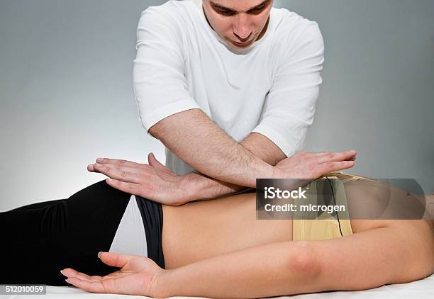 Osteopath Stock Photo - Download Image Now - Chiropractor, Osteopath, 30-39 Years