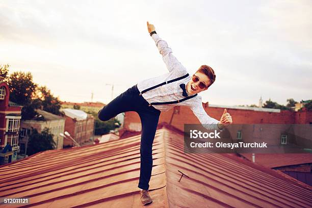Young Happy Hipster Girl Jump On Roof Stock Photo - Download Image Now - Adventure, Brick, Confidence