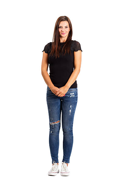 istock Young brunette in modern casual clothes holding her hands. 512011333