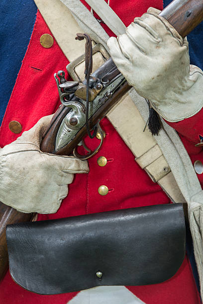 Soldier Holding His Musket Reenactor Continental Light Dragoon from the American Revolution holding his musket historical reenactment stock pictures, royalty-free photos & images