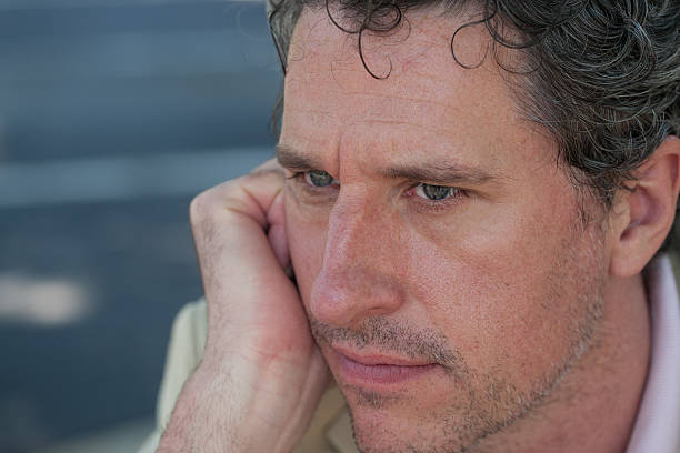 istock Portrait of confident professional man in deep thought 512012117