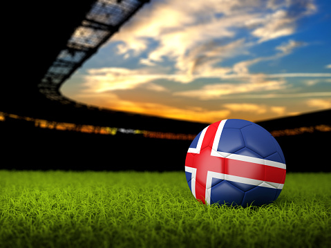 Soccer Stadium Background with Ball, Iceland Flag. High detailed 3D of Soccer ball with national flag and grass against stadium
