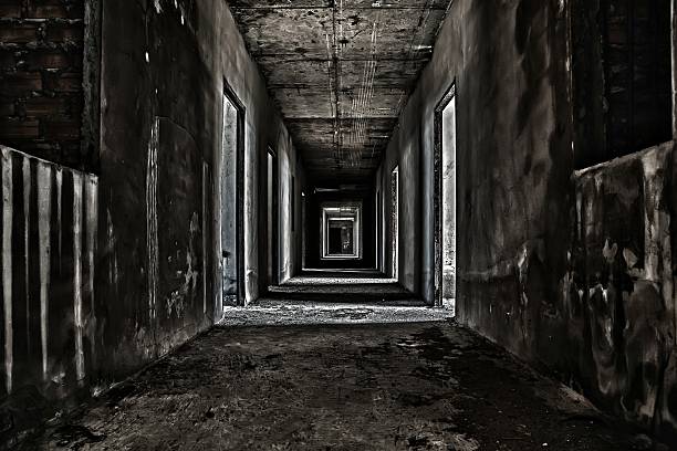 scary hallway walkway in abandoned building scary hallway walkway in abandoned building torture photos stock pictures, royalty-free photos & images