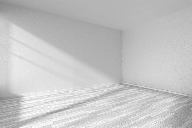 istock Empty room with white parquet floor and textured white walls 512037820
