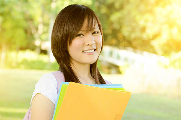 istock Young Asian college girl 512038078
