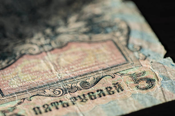 Obsolete banknotes in five Russian rubles 1909 close up