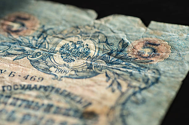 istock Obsolete banknotes in five Russian rubles 1909 close up 512039610