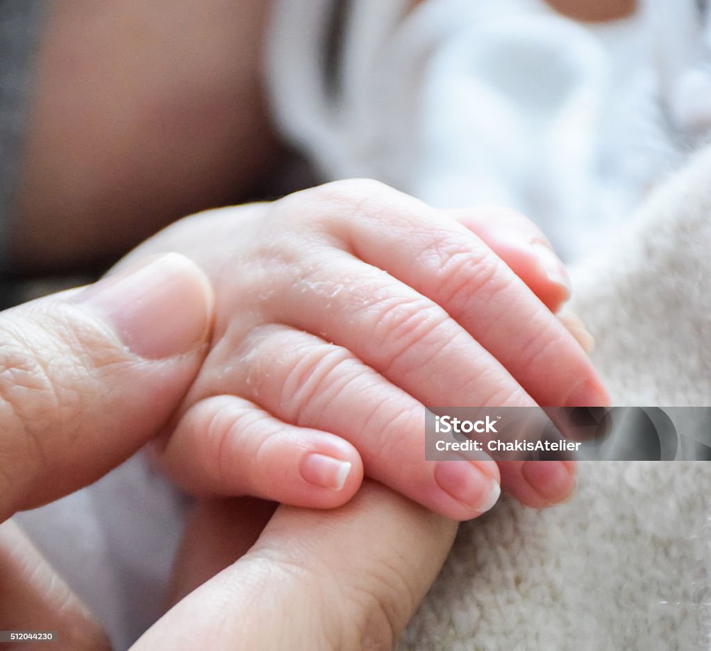 Mom Hand And Baby Love At First Sight Stock Photo - Download Image ...