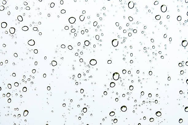 istock Drops of rain on glass , rain drops on clear window 512045694