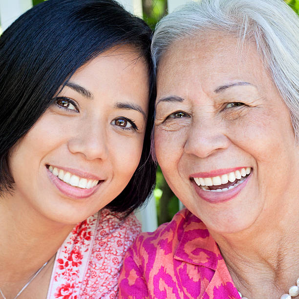 istock Happy Mature Asian Woman & Daughter 512046183