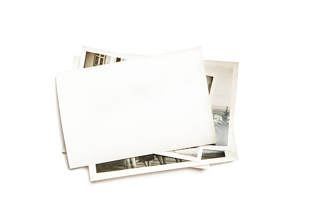 Stack of old photos Stack of old photos. The top one is blank. art and craft equipment photos stock pictures, royalty-free photos & images