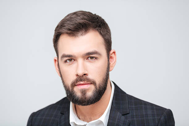 istock Serious businessman looking at camera 512050694