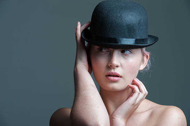 istock Girl in bowler hat 512051096