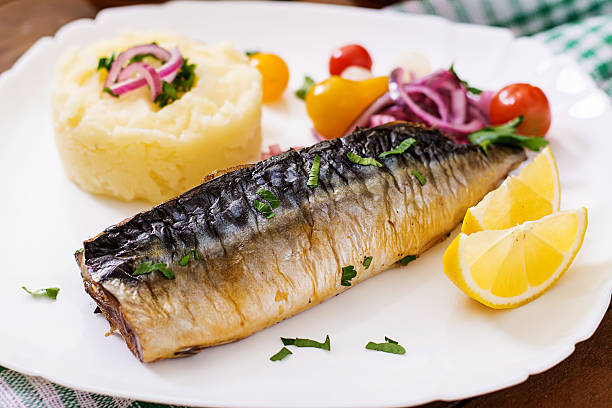 istock Baked mackerel with herbs and garnished with mashed potatoes 512051524
