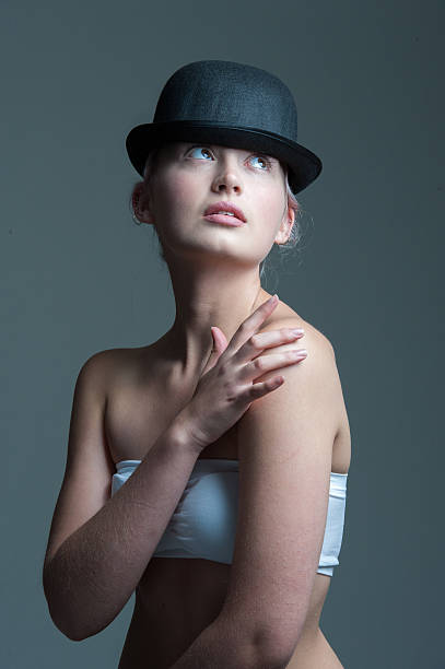 istock Girl in bowler hat 512051544