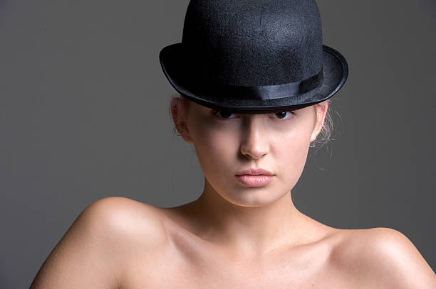 istock Girl in bowler hat 512052048
