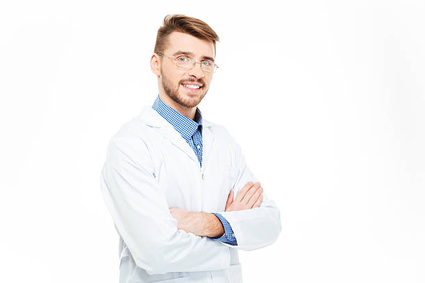 istock Male doctor in glasses standing with arms folded 512052462