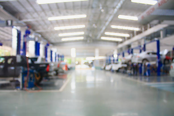 car repair service center blurred background car repair maintenance service center blurred background auto repair shop stock pictures, royalty-free photos & images