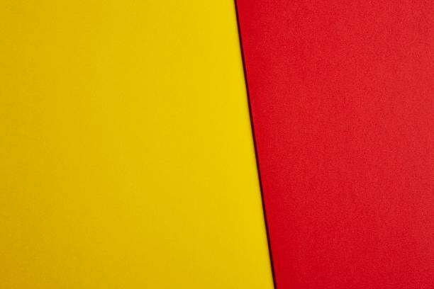 istock Colored carboards background in yellow and red tone. Copy space 512054282