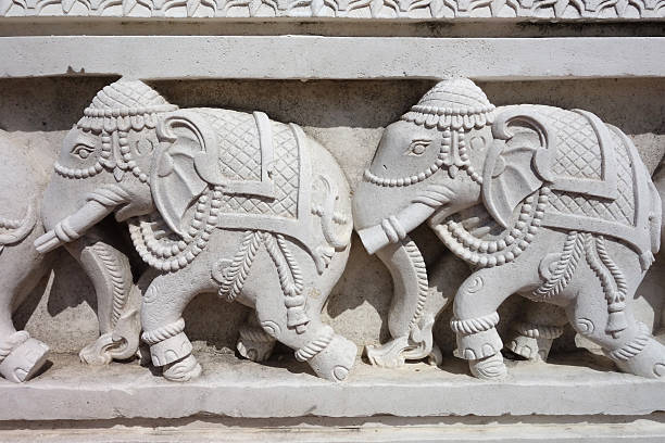 istock Hindu elephants carved in limestone 512054690