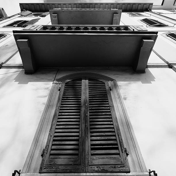 istock Large old window with majestic balcony 512055224