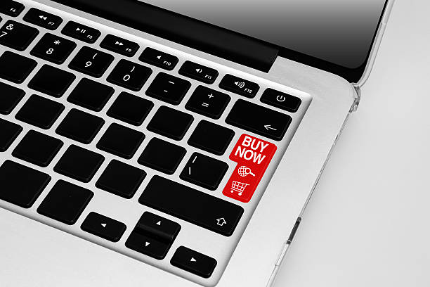 istock Keyboard with red buy now online shopping theme button 512055434