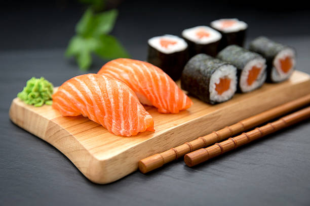 istock Sushi Nigiri with fresh salmon and Maki roll 512056476
