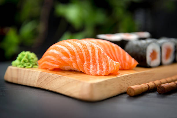 istock Sushi Nigiri with fresh salmon and Maki roll 512056534