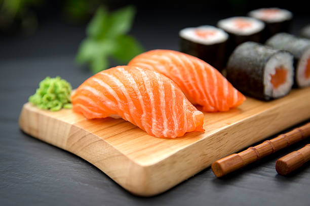 istock Sushi Nigiri with fresh salmon and Maki roll 512056652